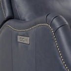 Fauteuil inclinable électrique double avec garniture cloutée en cuir véritable et port USB, idéal pour le home cinéma.