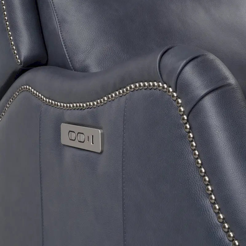 Fauteuil inclinable électrique double avec garniture cloutée en cuir véritable et port USB, idéal pour le home cinéma.