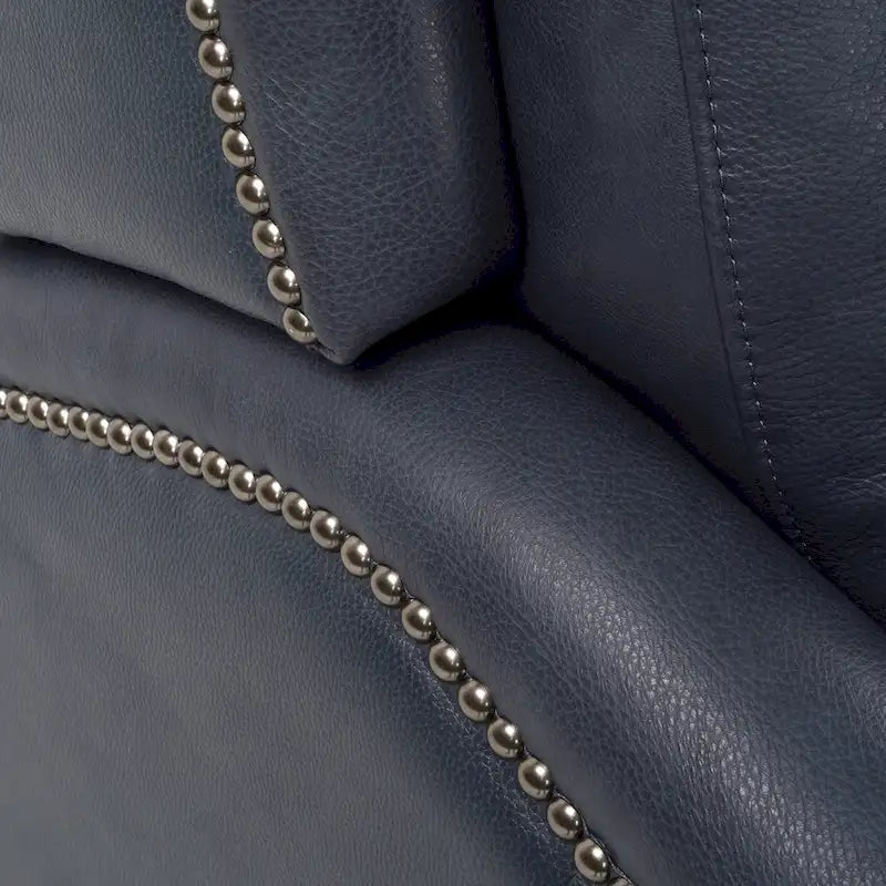 Fauteuil inclinable électrique double avec garniture cloutée en cuir véritable et port USB, idéal pour le home cinéma.