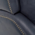 Fauteuil inclinable électrique double avec garniture cloutée en cuir véritable et port USB, idéal pour le home cinéma.